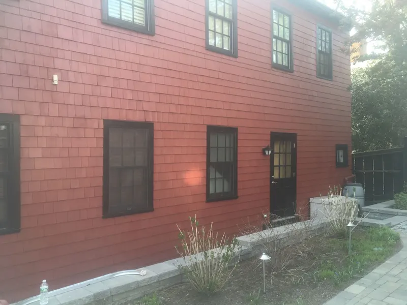 Two-story house with finished exterior paint