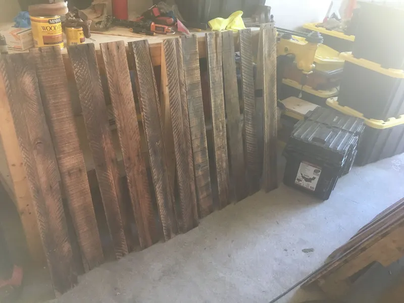 Stained reclaimed wood boards ready to install