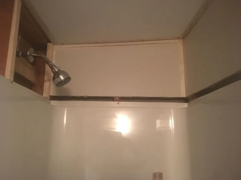 Shower surround prepped for new wall panels