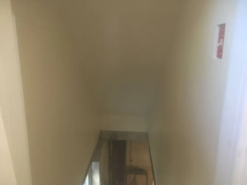 Stairwell walls finished and painted white