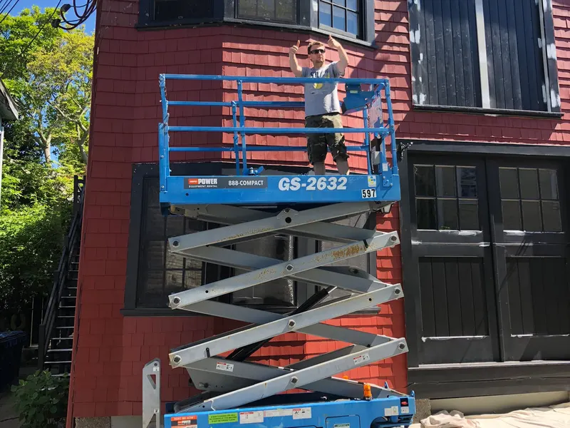 Exterior painting from a scissor lift