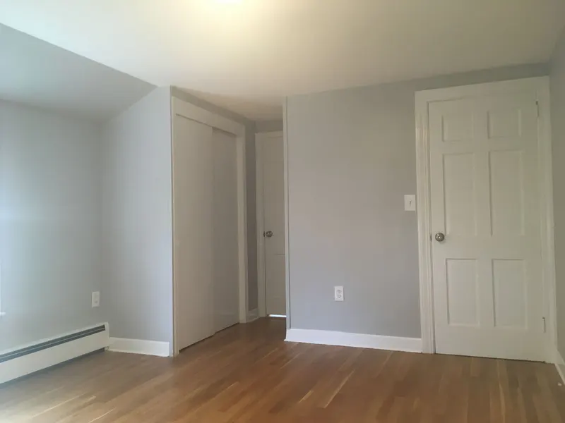 Freshly painted room with white doors and trim